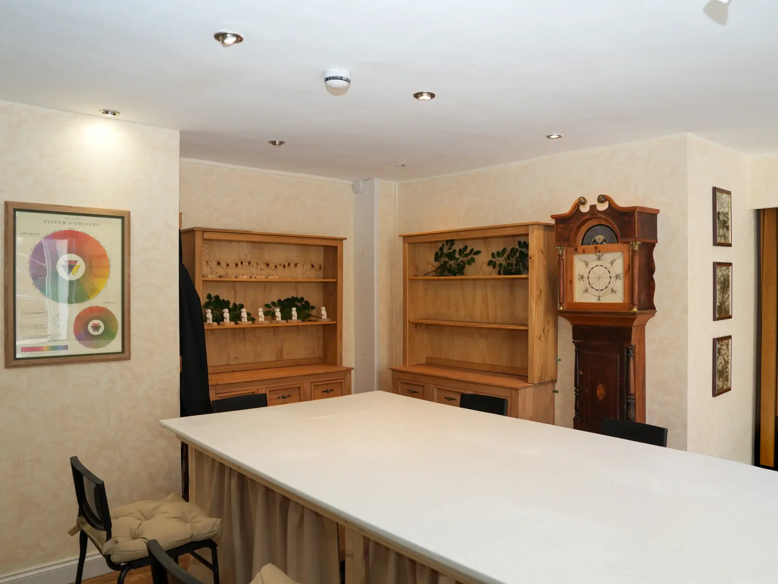The craft room at The Lincoln Imporium, with its large central table and Castle Square views